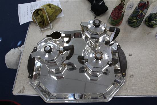 An Art Deco Christofle Gallia pattern five piece silver plated coromandel wood mounted tea and coffee set, tray 20in.